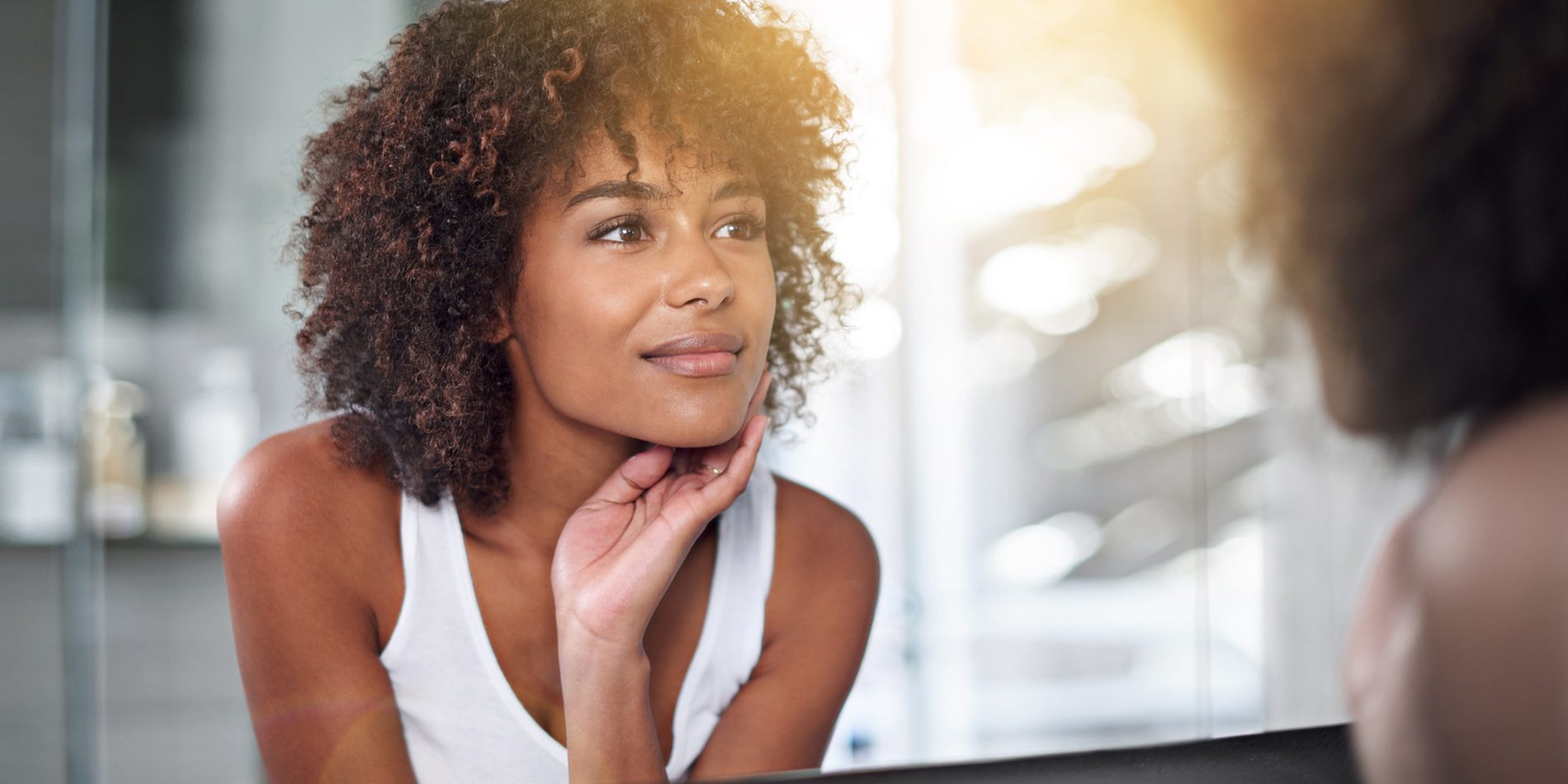 Cropped shot of a young woman examining her skin in the bathroomhttp://195.154.178.81/DATA/i_collage/pi/shoots/783545.jpg