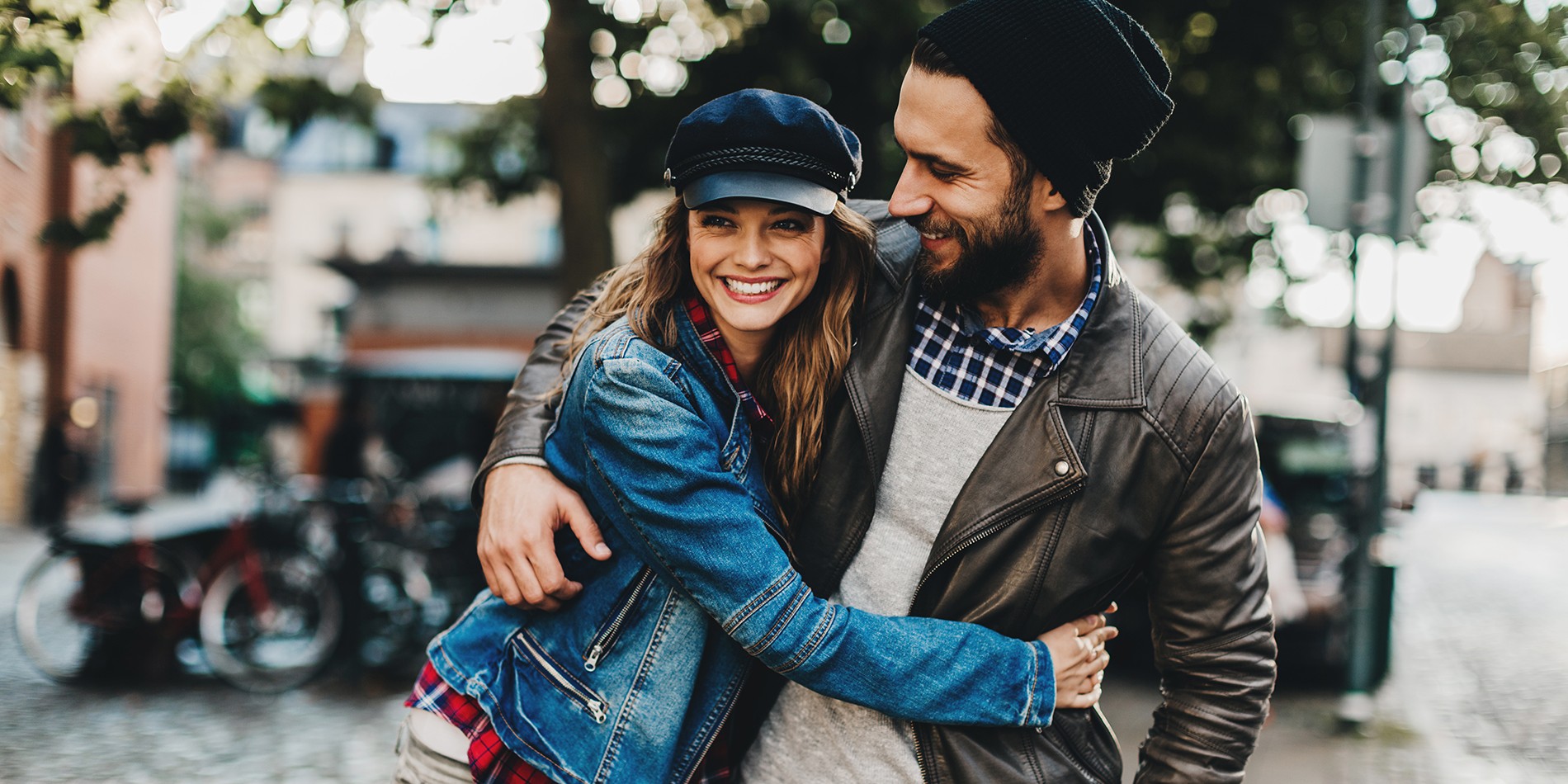 Close up of a happy young couple enjoying city life.