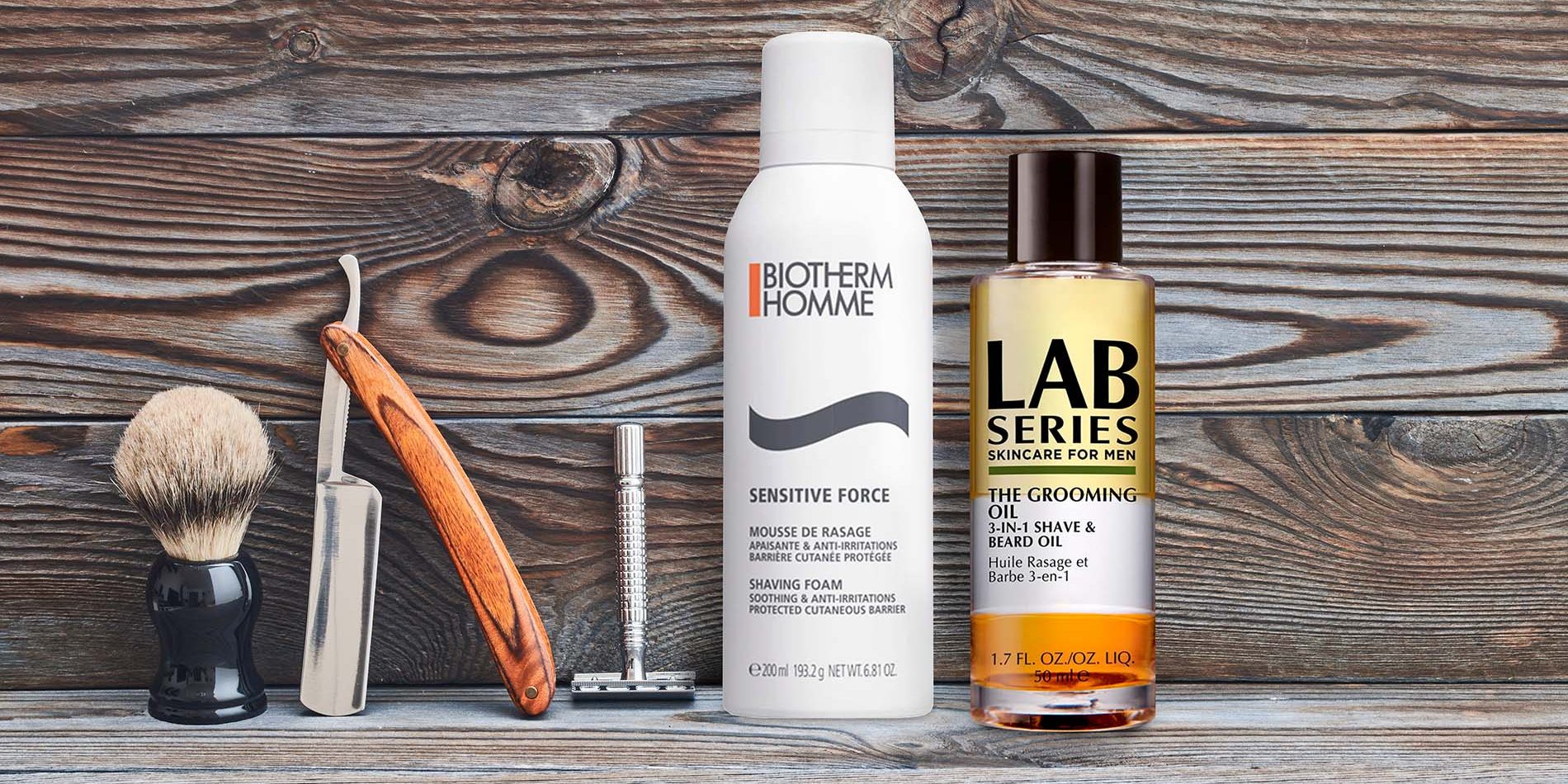 Vintage barber shop tools on old wooden background with copy space