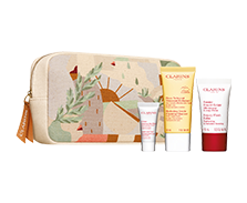 Clarins - Beauty purse met drie luxe miniaturen Clarins - Beauty purse met drie luxe miniaturen